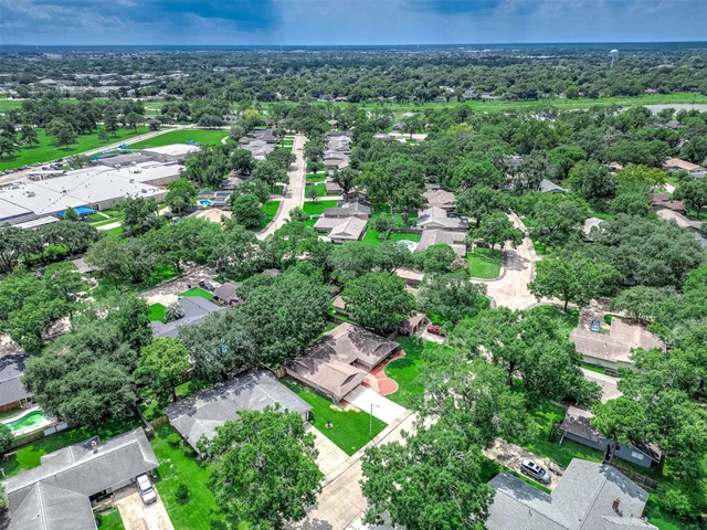 an aerial view of a house with garden