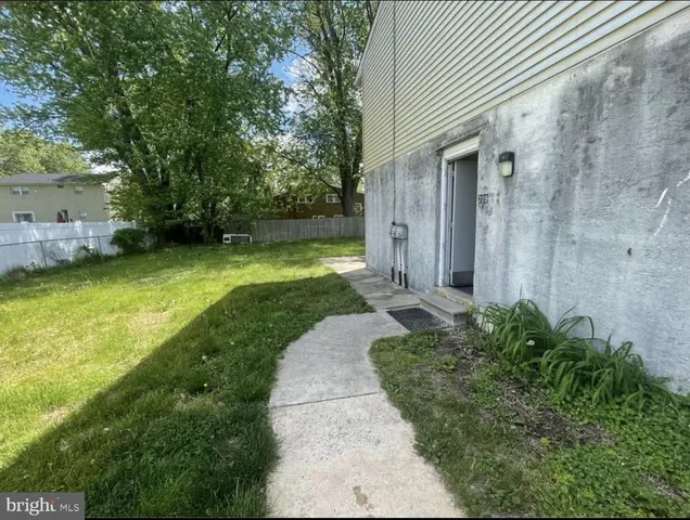 a view of a backyard with a garden