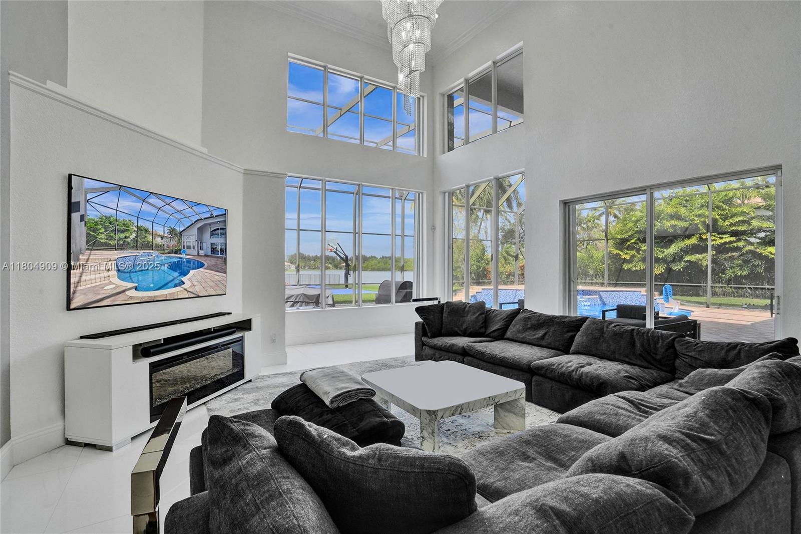 10457 Laurel Road Davie, FL 33328 - Photo 7 of 96 a living room with furniture and a large window