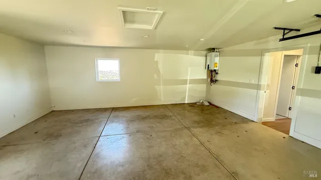 a view of a big room with a chandeliers