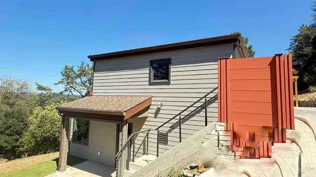 a house view with a backyard space
