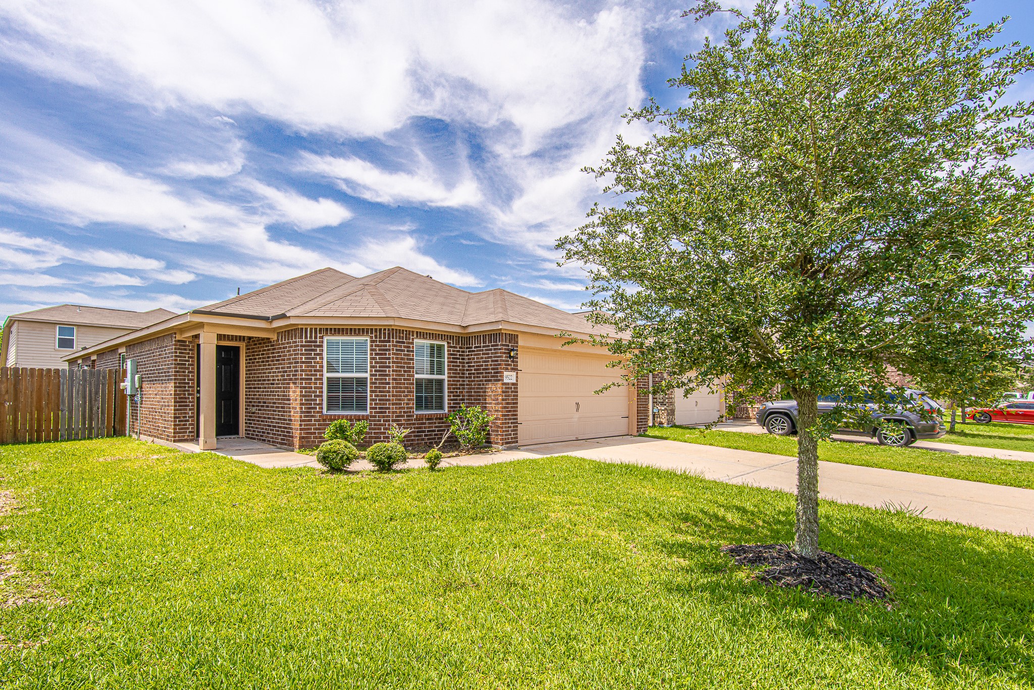 9522 Olive Stone Drive Rosharon, TX 77583 - Photo 3 of 29 a view of a house with a big yard and large trees
