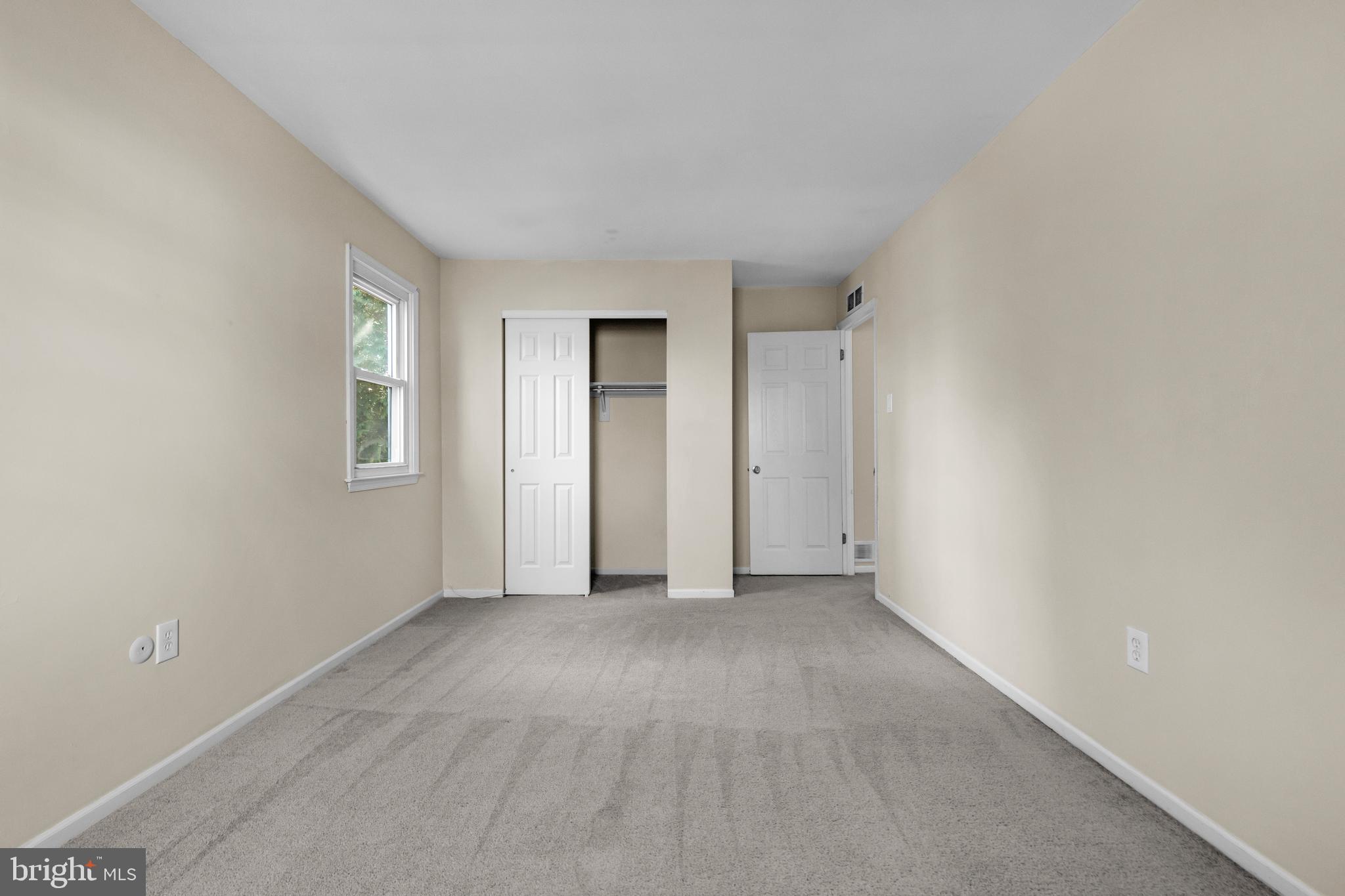 2773 Anvil Place Doylestown, PA 18902 - Photo 15 of 36 a view of an empty room with closet and a window
