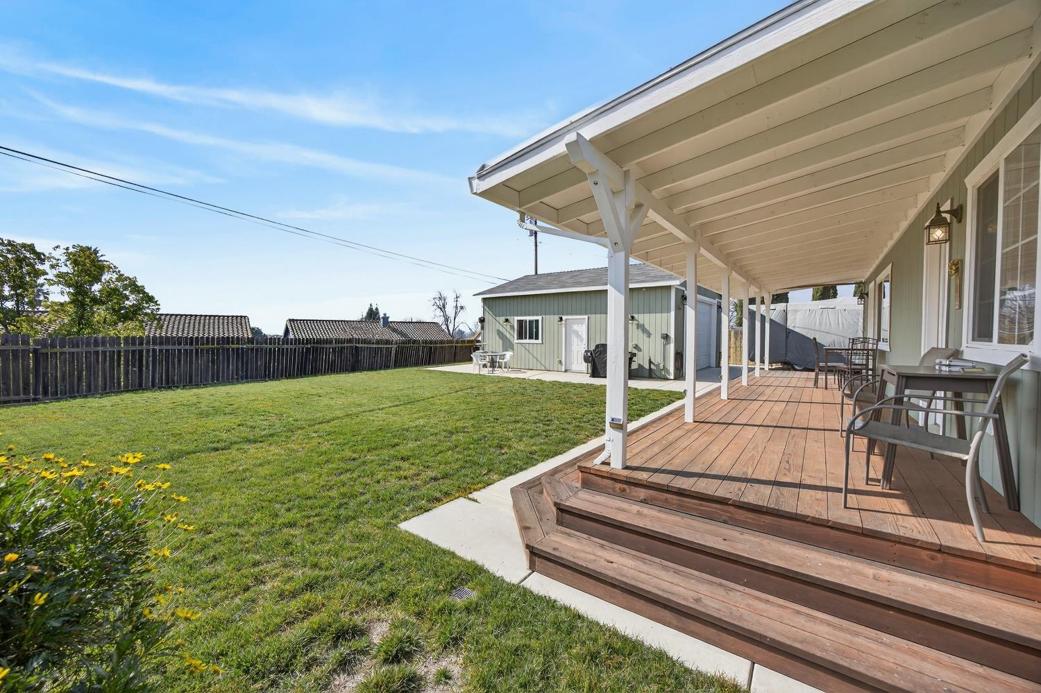 145 Oak Ridge Drive Ione, CA 95640 - Photo 11 of 61 a view of a house with backyard and sitting area