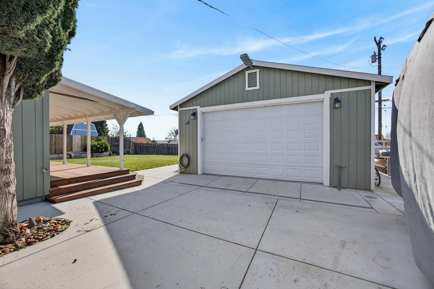 145 Oak Ridge Drive Ione, CA 95640 - Photo 17 of 61 a front view of a house with a garden