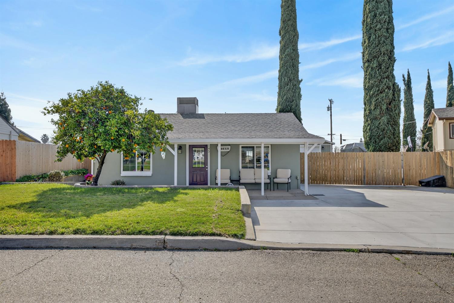 145 Oak Ridge Drive Ione, CA 95640 - Photo 2 of 61 a front view of a house with a yard and garage