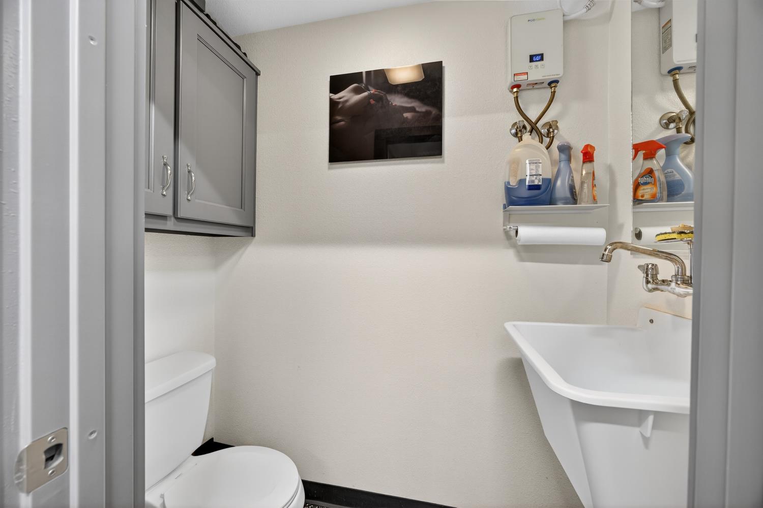 145 Oak Ridge Drive Ione, CA 95640 - Photo 23 of 61 a bathroom with a toilet and a sink