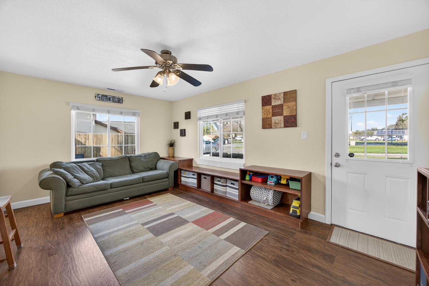 145 Oak Ridge Drive Ione, CA 95640 - Photo 26 of 61 a living room with furniture and a wooden floor