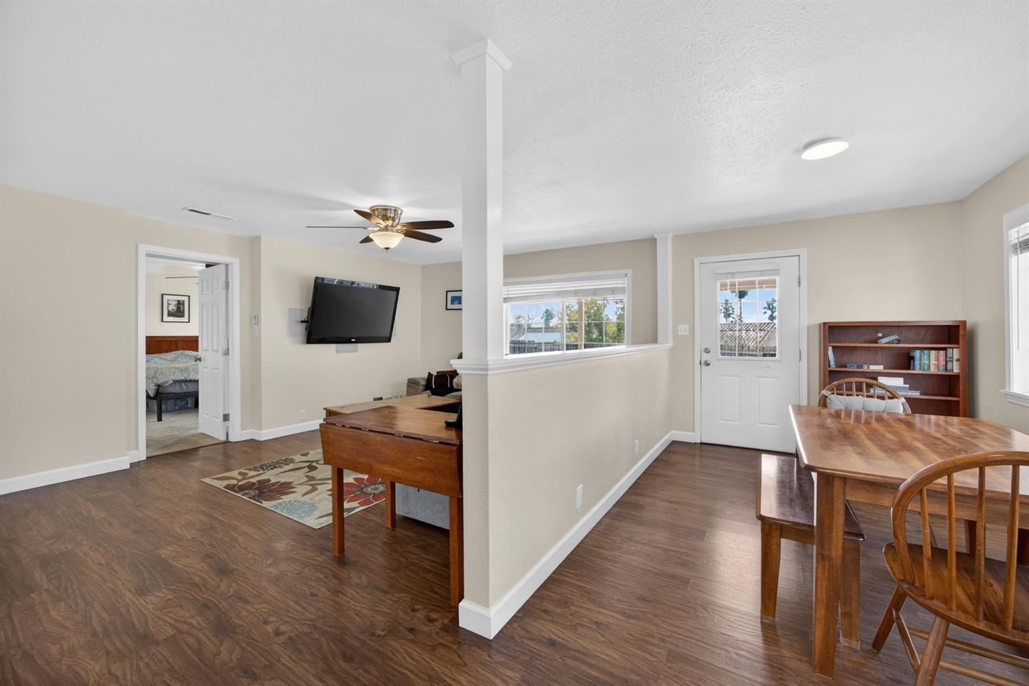 145 Oak Ridge Drive Ione, CA 95640 - Photo 36 of 61 a living room with furniture and a flat screen tv