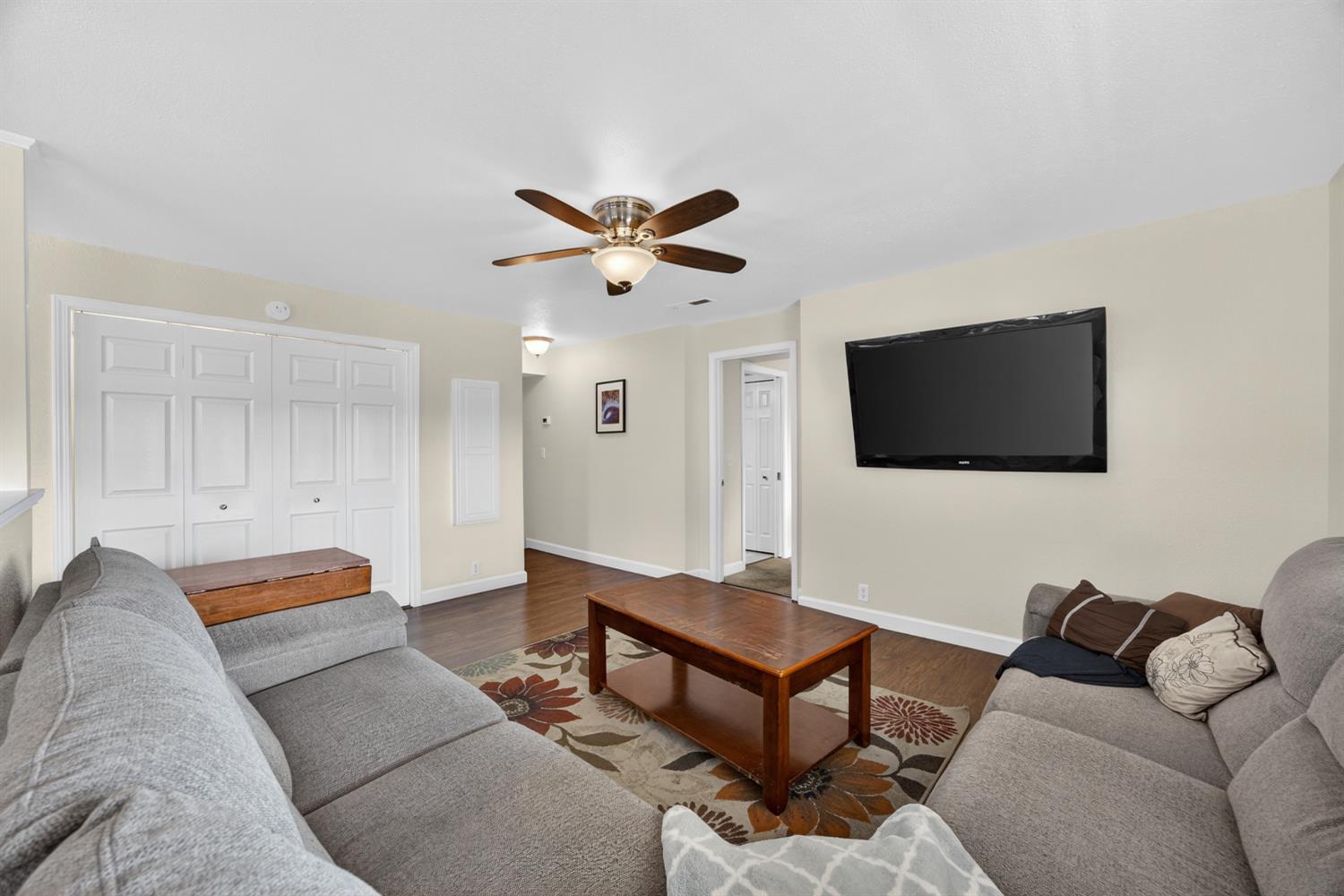 145 Oak Ridge Drive Ione, CA 95640 - Photo 37 of 61 a living room with furniture and a flat screen tv