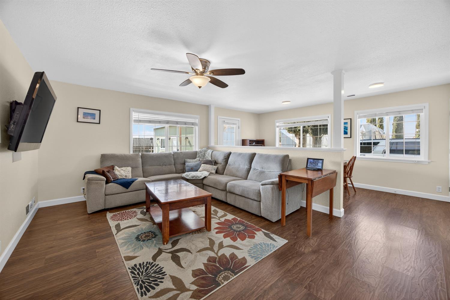 145 Oak Ridge Drive Ione, CA 95640 - Photo 39 of 61 a living room with furniture a flat screen tv and a window