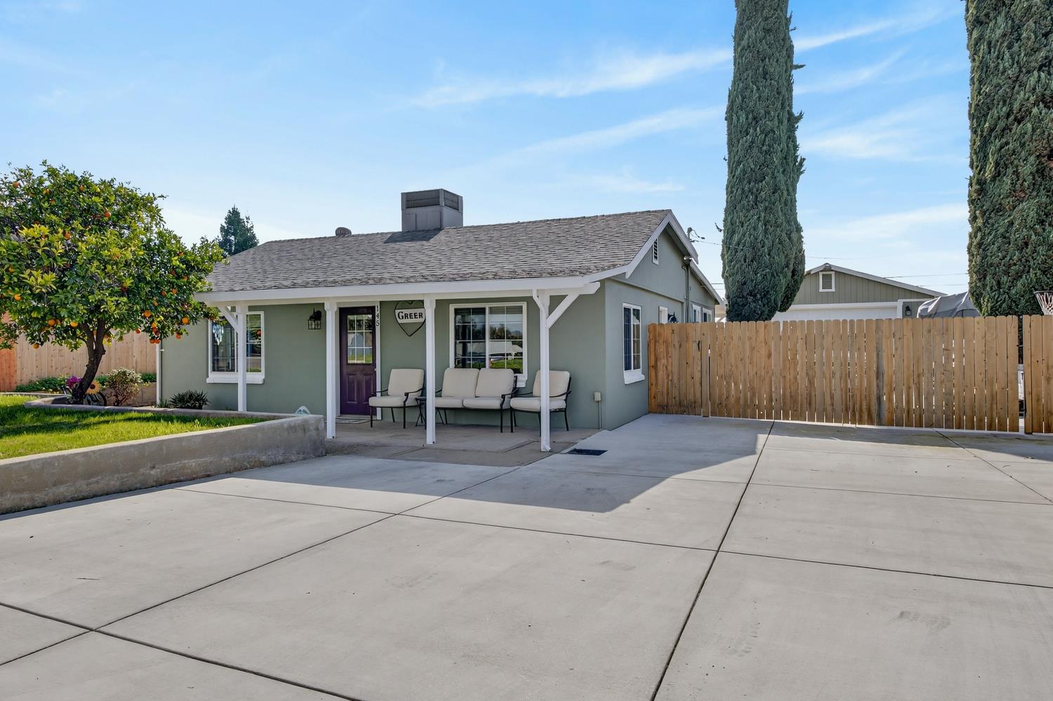 145 Oak Ridge Drive Ione, CA 95640 - Photo 4 of 61 a front view of a house with a garden and pathway