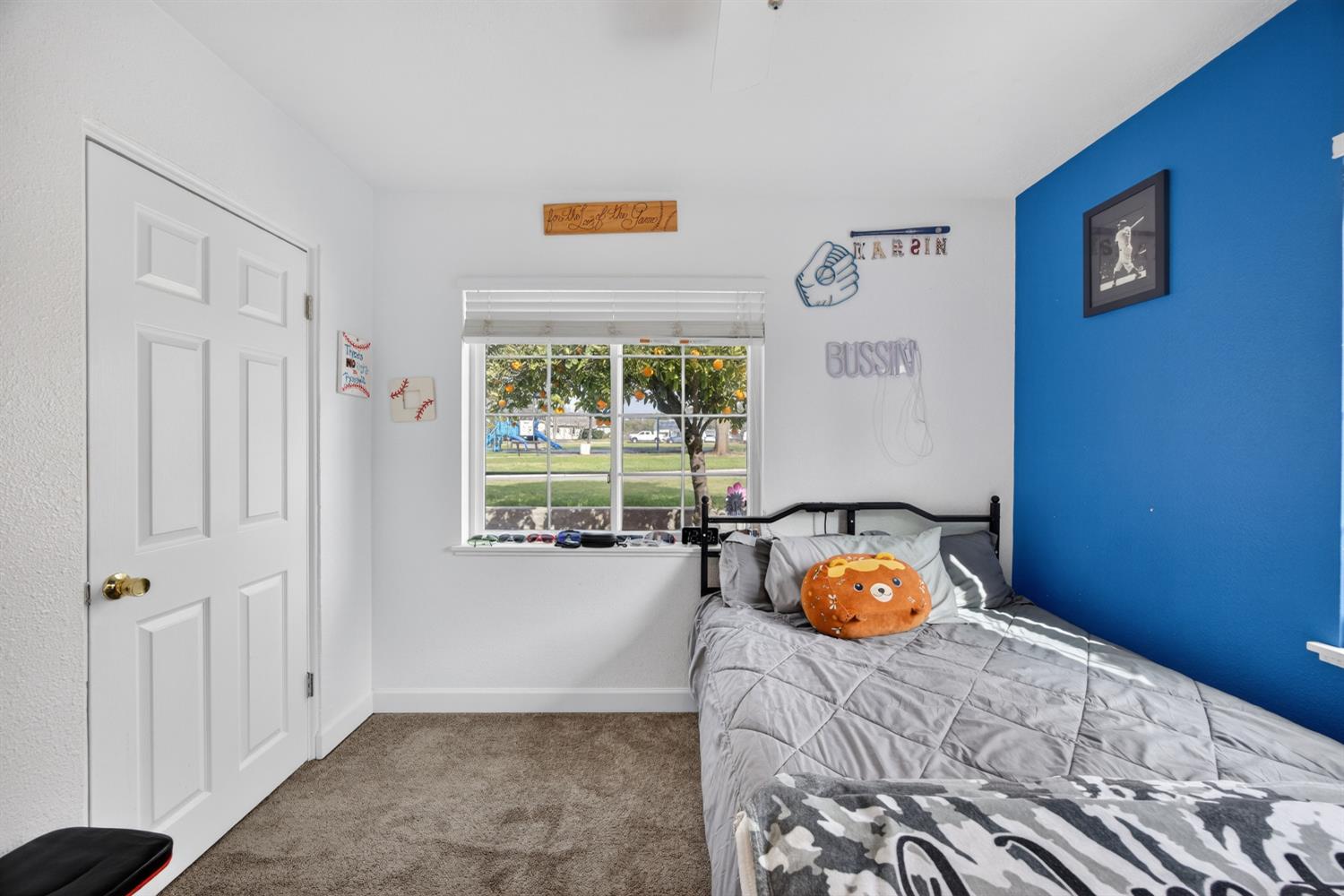 145 Oak Ridge Drive Ione, CA 95640 - Photo 43 of 61 a bedroom with a bed and a window