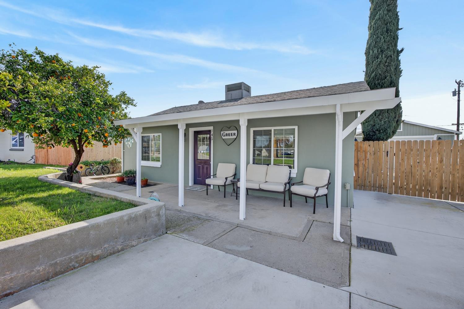 145 Oak Ridge Drive Ione, CA 95640 - Photo 5 of 61 a view of a house with backyard and a sitting area