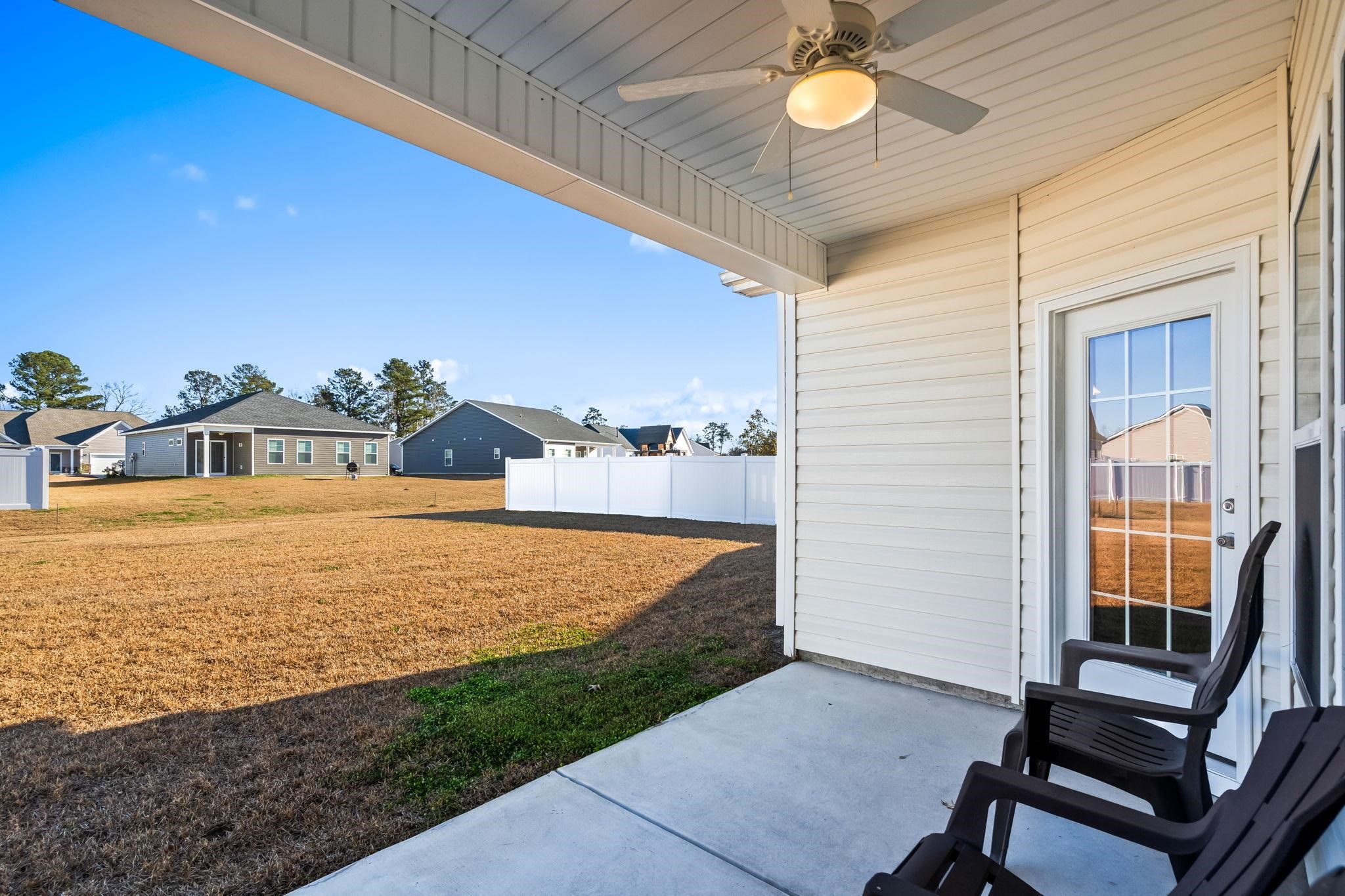 447 Honeyhill Loop Conway, SC 29526 - Photo 16 of 39 View of patio with a ceiling fan