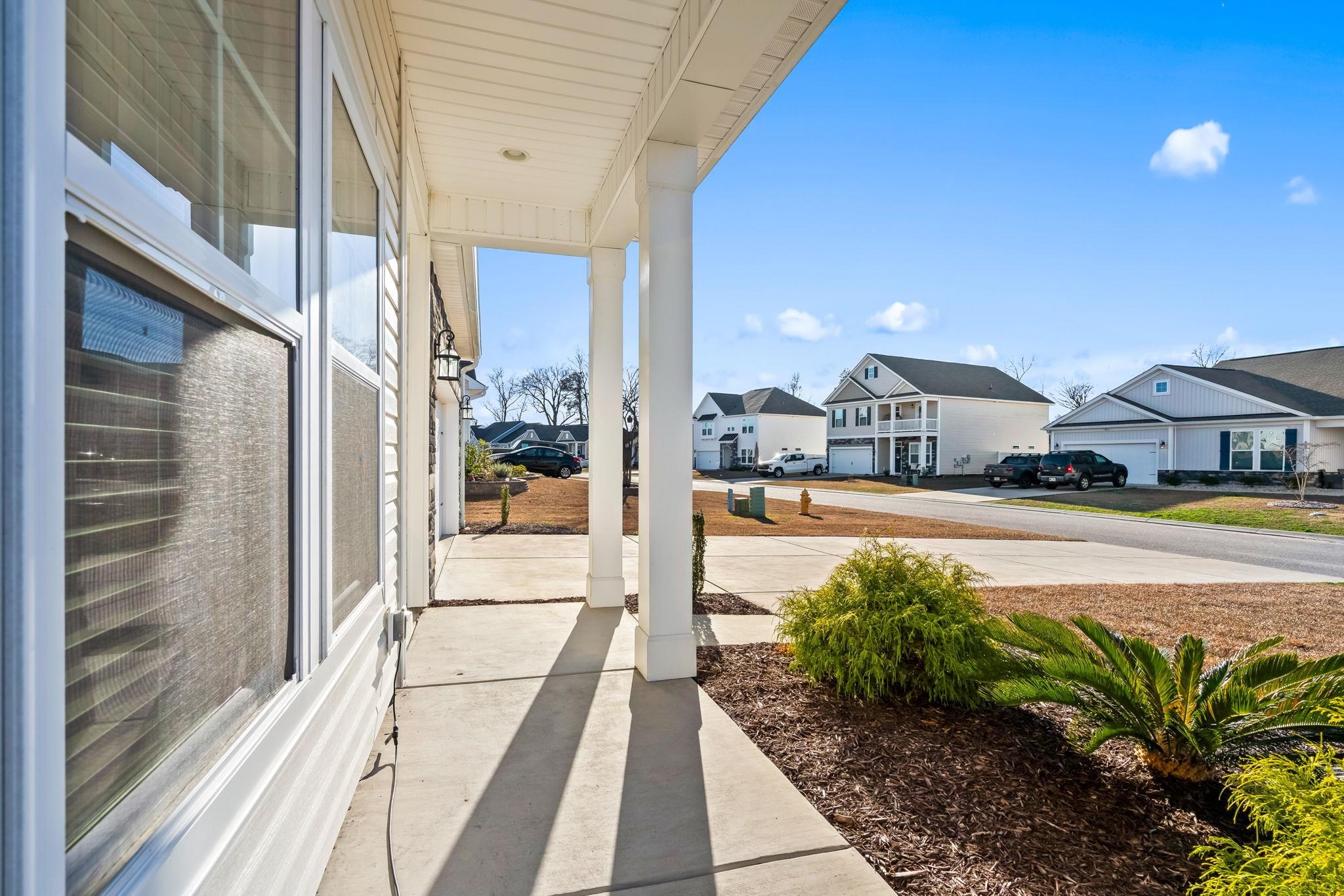 447 Honeyhill Loop Conway, SC 29526 - Photo 2 of 39 Porch with a residential view
