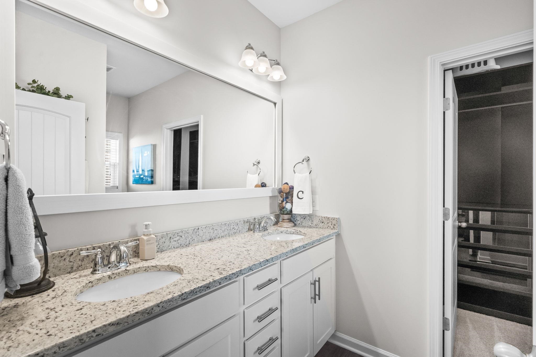 447 Honeyhill Loop Conway, SC 29526 - Photo 19 of 39 Full bathroom featuring double vanity and baseboards