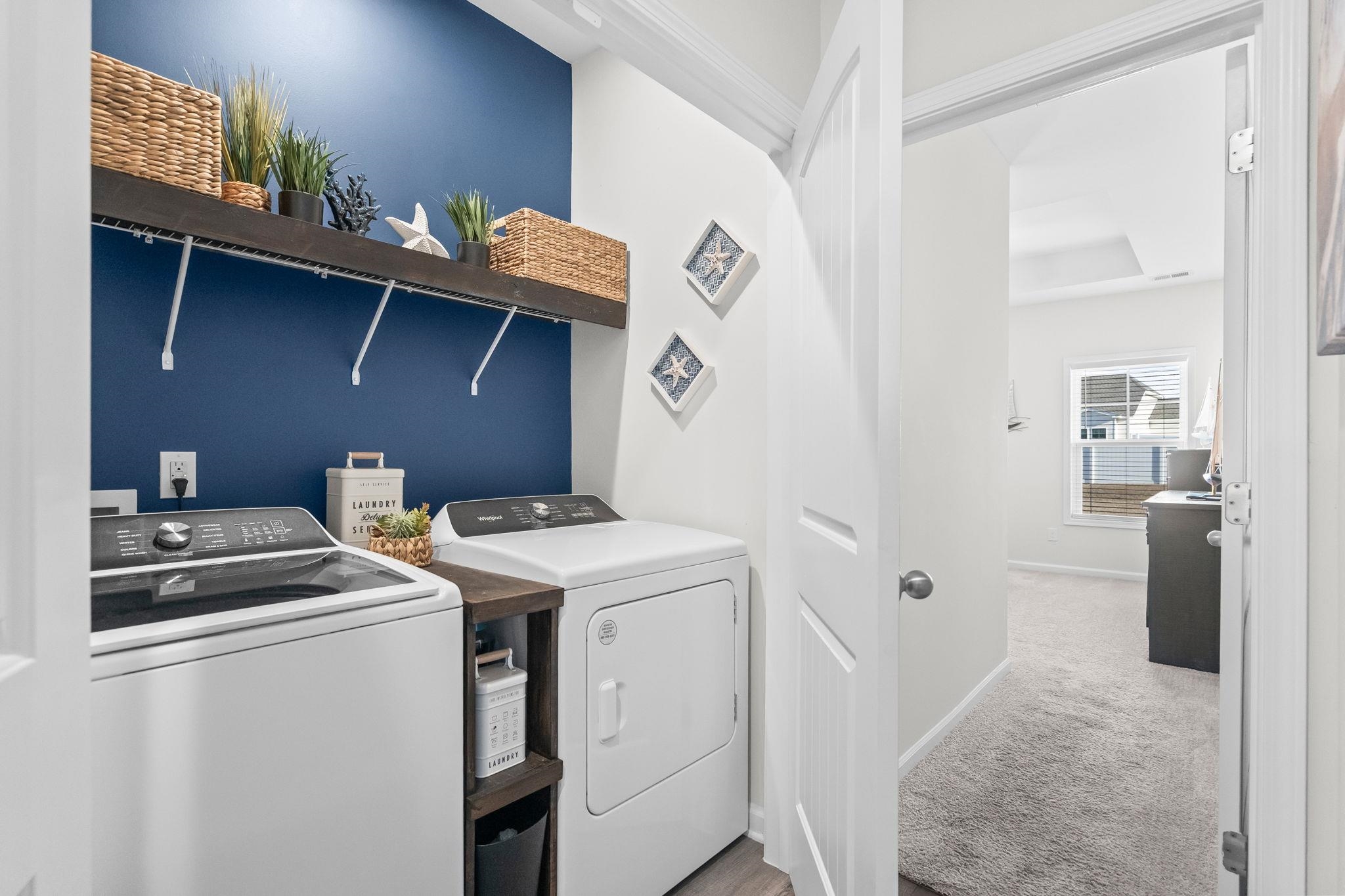 447 Honeyhill Loop Conway, SC 29526 - Photo 26 of 39 Laundry area featuring light carpet and washing machine and dryer
