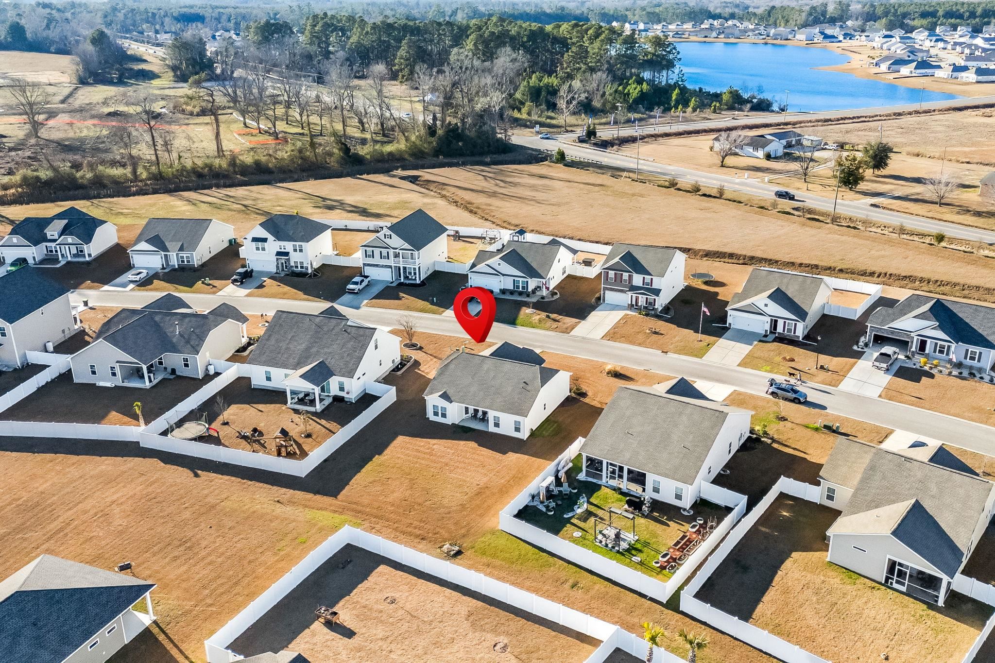 447 Honeyhill Loop Conway, SC 29526 - Photo 31 of 39 Aerial view of residential area featuring a nearby body of water