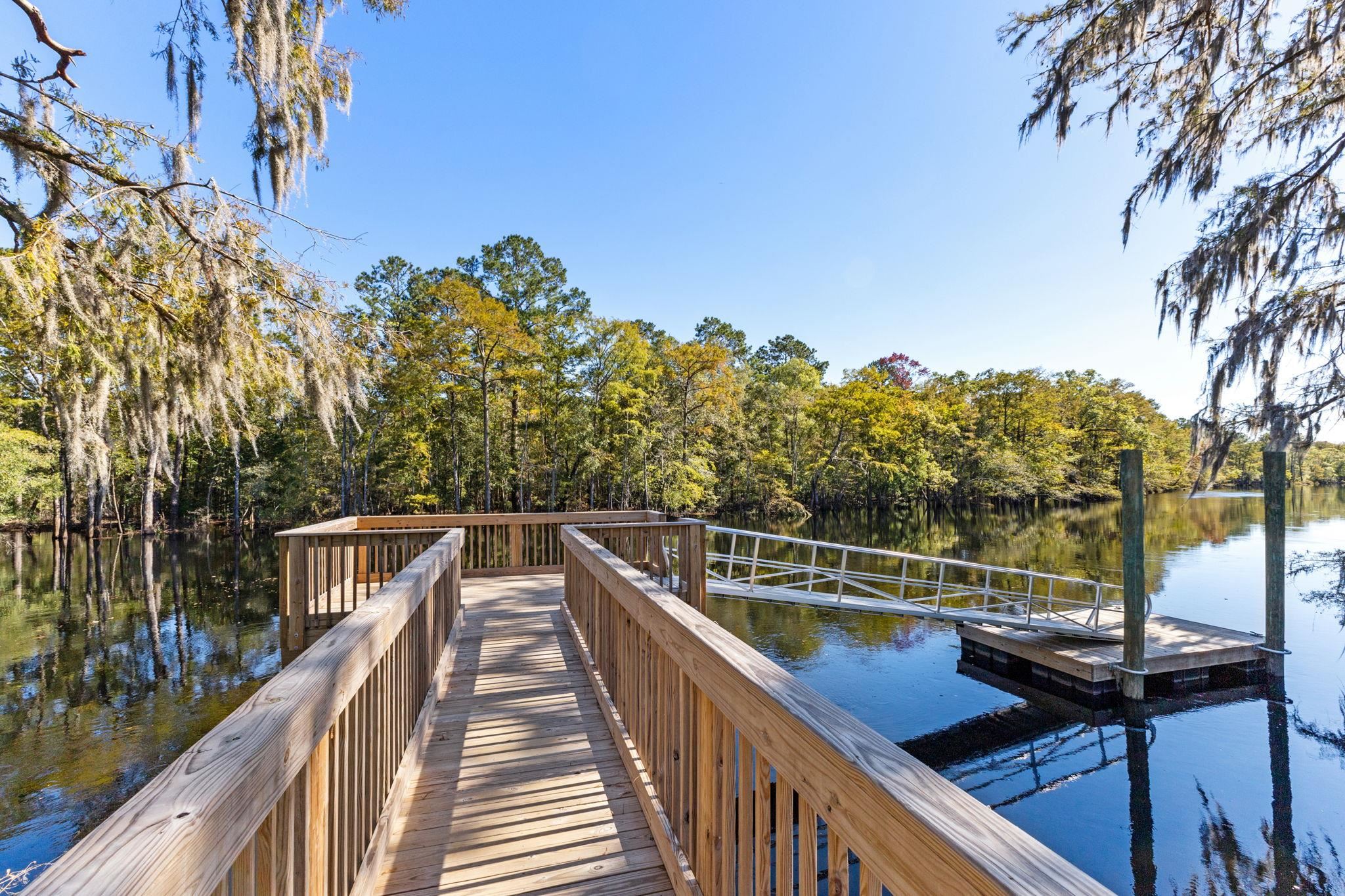 447 Honeyhill Loop Conway, SC 29526 - Photo 36 of 39 Dock area featuring a water view and a forest view