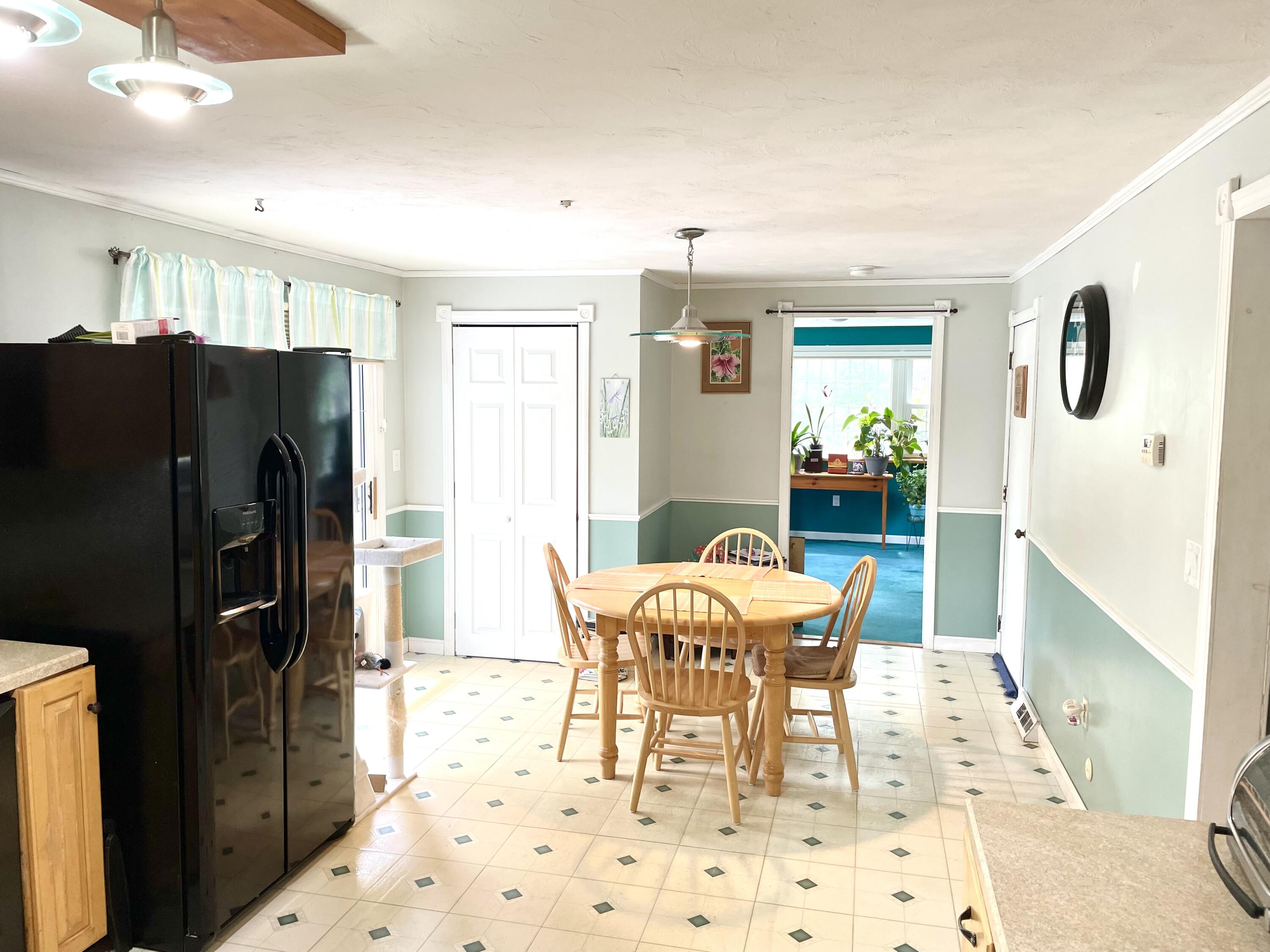 24 Fawn Road Mashpee, MA 02649 - Photo 11 of 23 a dining room with furniture and window