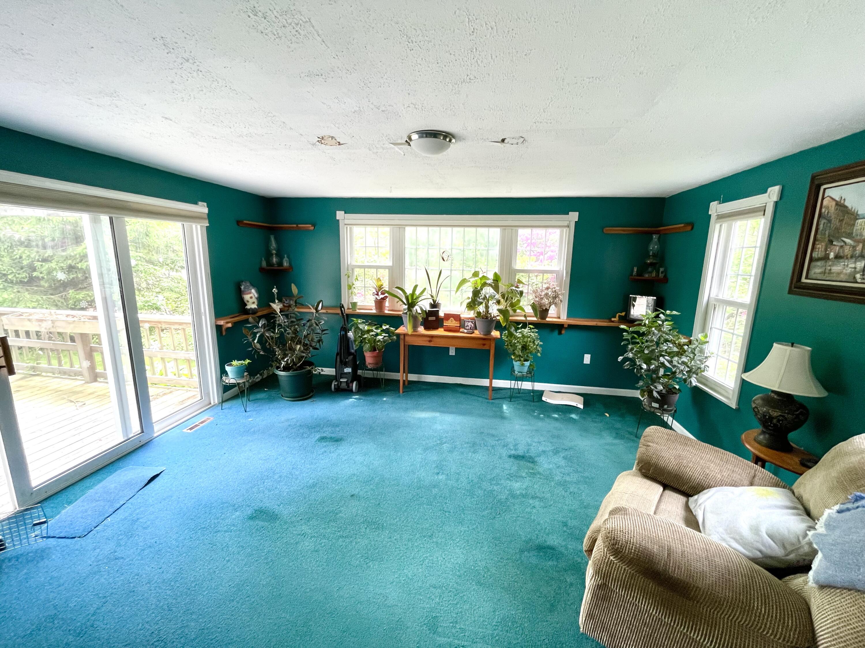 24 Fawn Road Mashpee, MA 02649 - Photo 13 of 23 a room with furniture and a large window