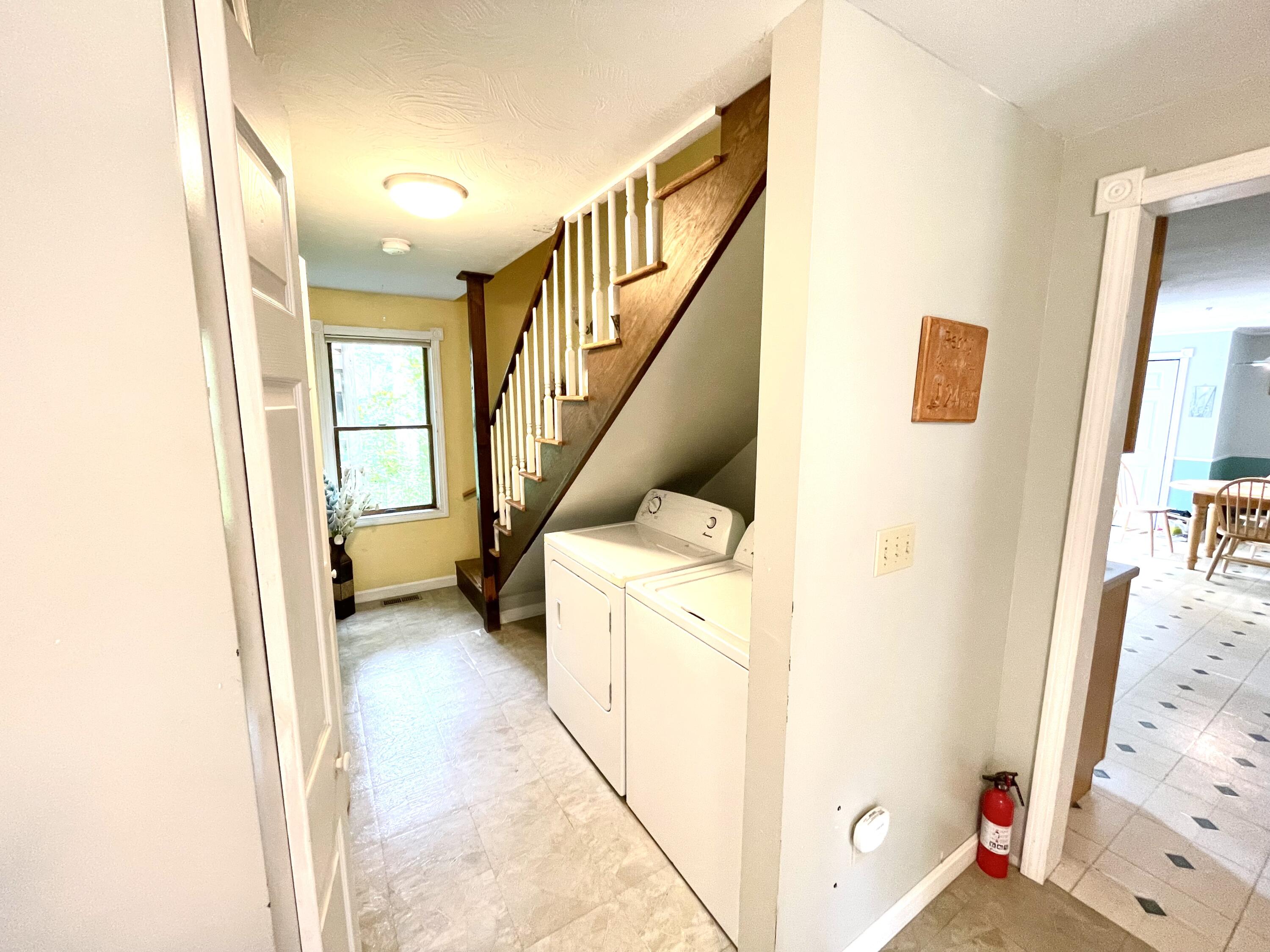 24 Fawn Road Mashpee, MA 02649 - Photo 22 of 23 a view of a hallway with wooden floor and entryway