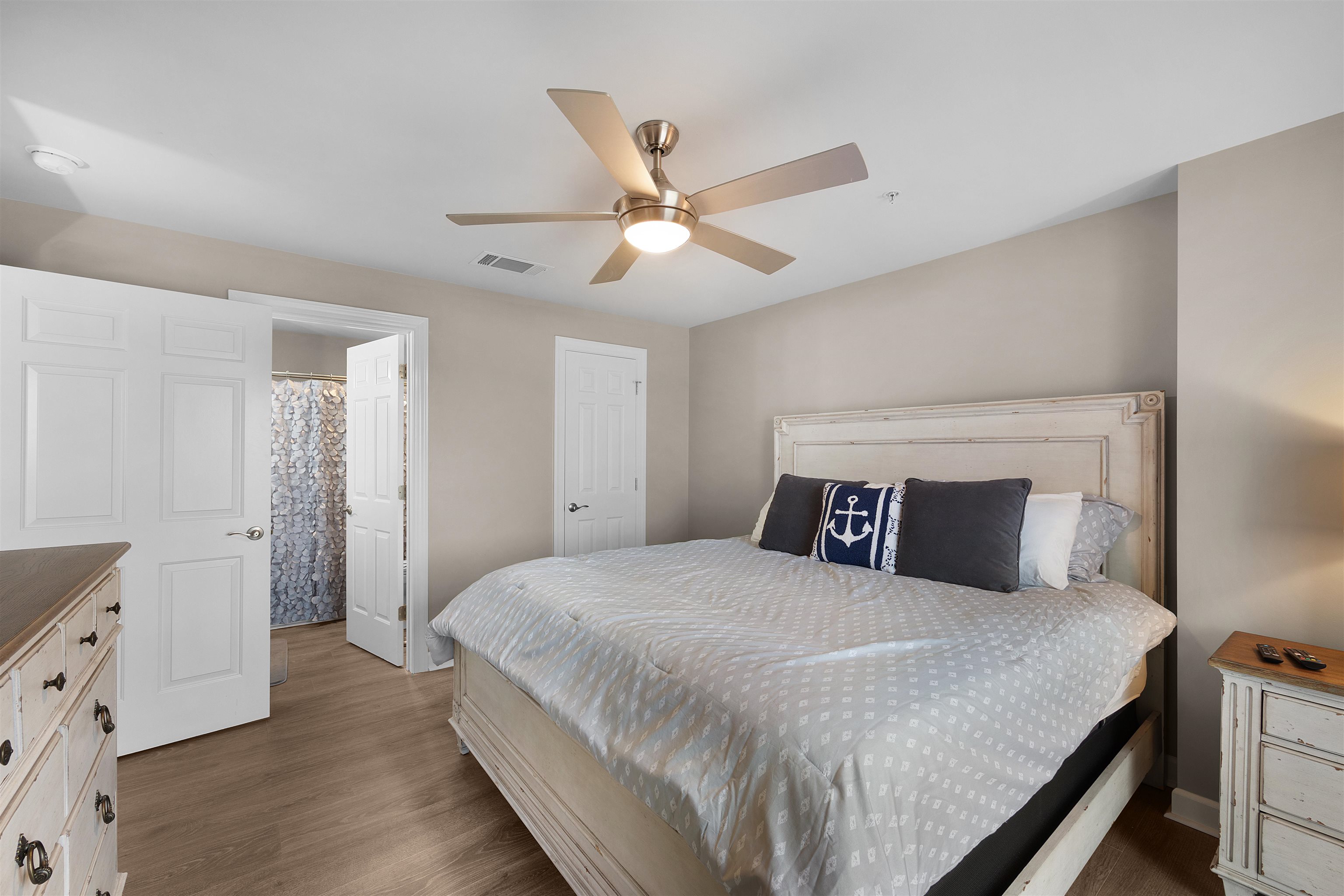 323 Cr 380 Road, Unit P 506 Iuka, MS 38852 - Photo 13 of 21 Bedroom featuring dark wood finished floors, a ceiling fan, and ensuite bath