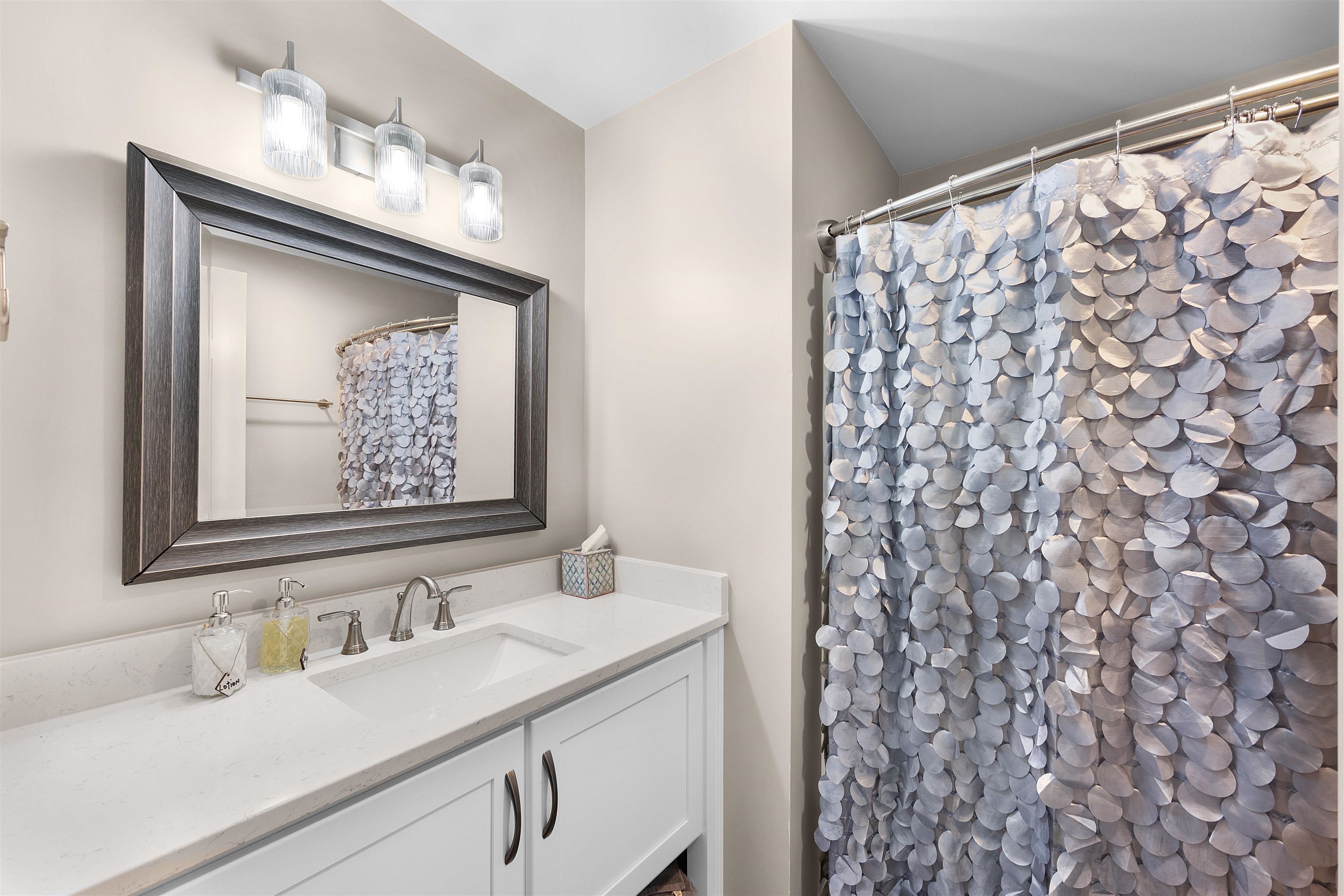323 Cr 380 Road, Unit P 506 Iuka, MS 38852 - Photo 14 of 21 Full bath featuring vanity and a shower with shower curtain