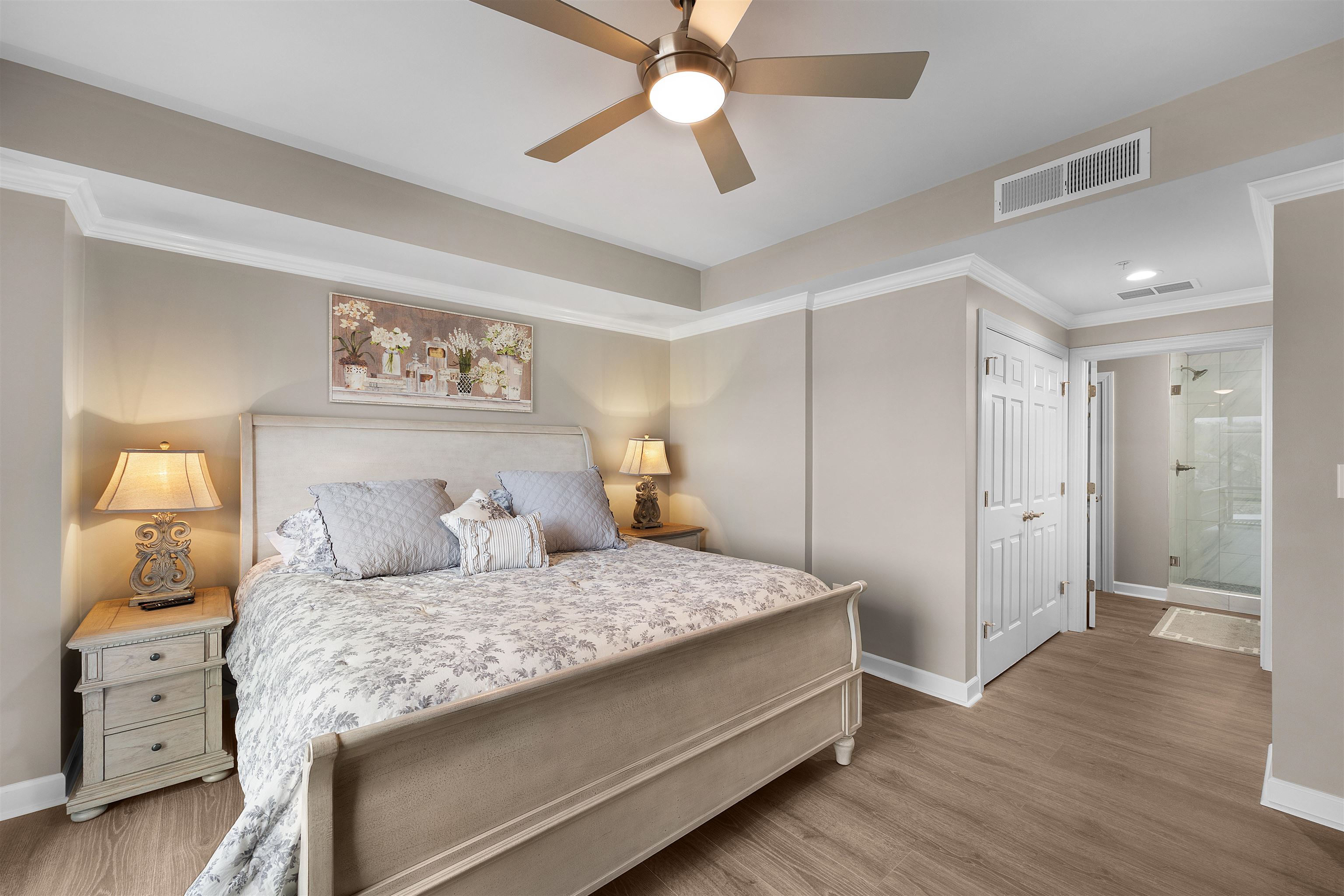 323 Cr 380 Road, Unit P 506 Iuka, MS 38852 - Photo 9 of 21 Bedroom featuring crown molding, a ceiling fan, light wood-style flooring, connected bathroom, and a closet
