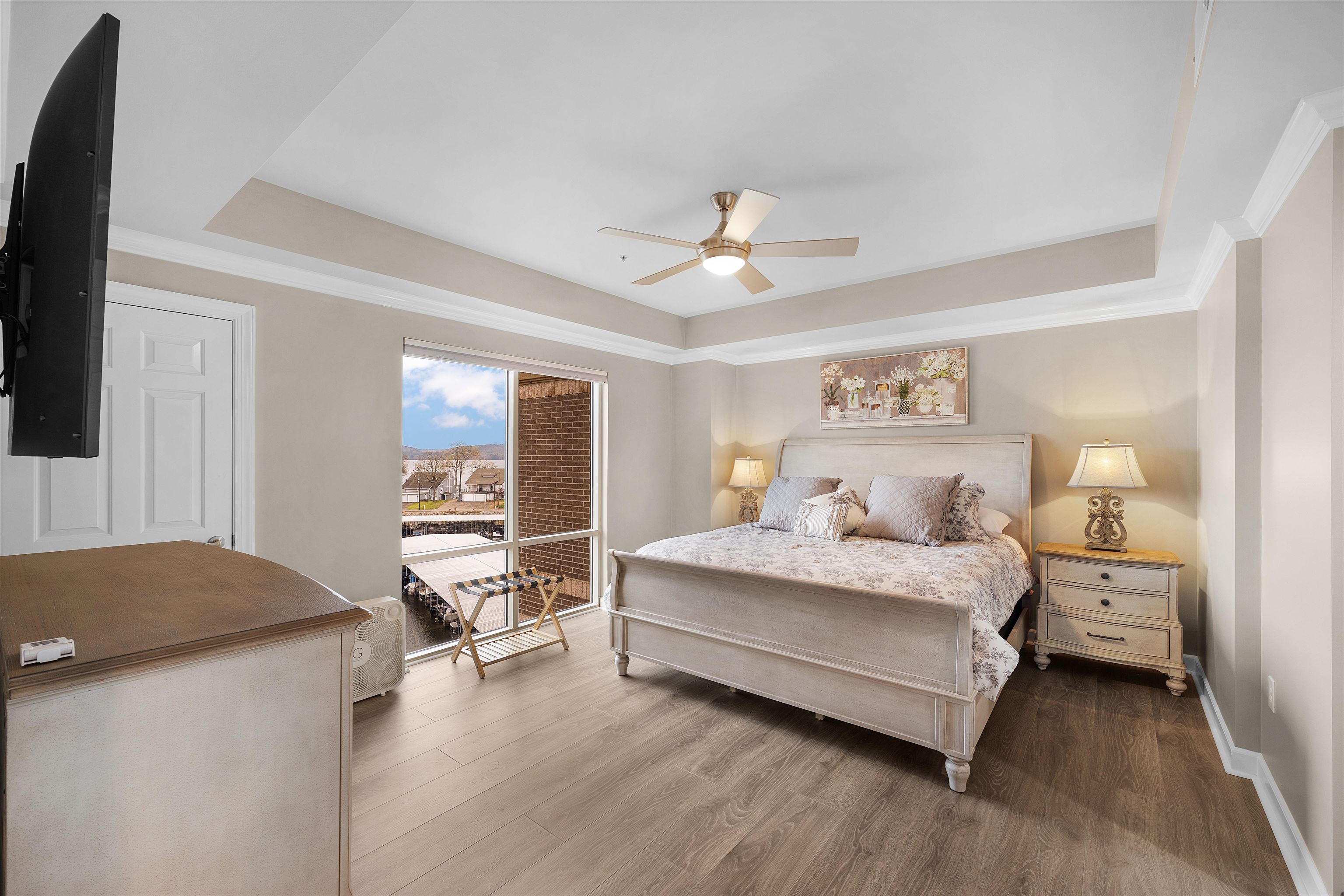 323 Cr 380 Road, Unit P 506 Iuka, MS 38852 - Photo 10 of 21 Bedroom with a raised ceiling, ornamental molding, dark wood-style flooring, and ceiling fan