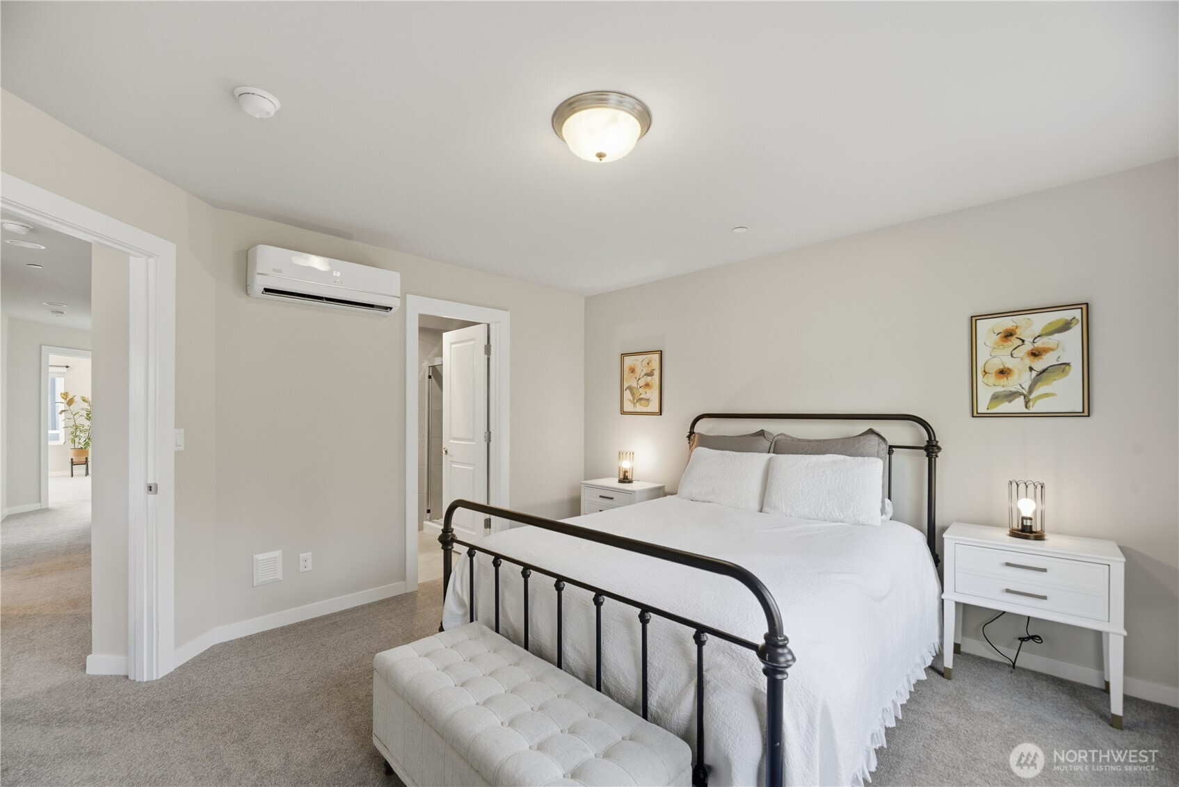 1621 Seattle Hill Road, Unit J5 Bothell, WA 98012 - Photo 29 of 40 a bedroom with a bed and a lamp
