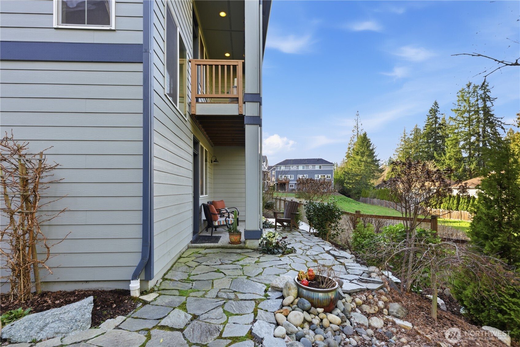 1621 Seattle Hill Road, Unit J5 Bothell, WA 98012 - Photo 8 of 40 a view of a porch with chairs and potted plants