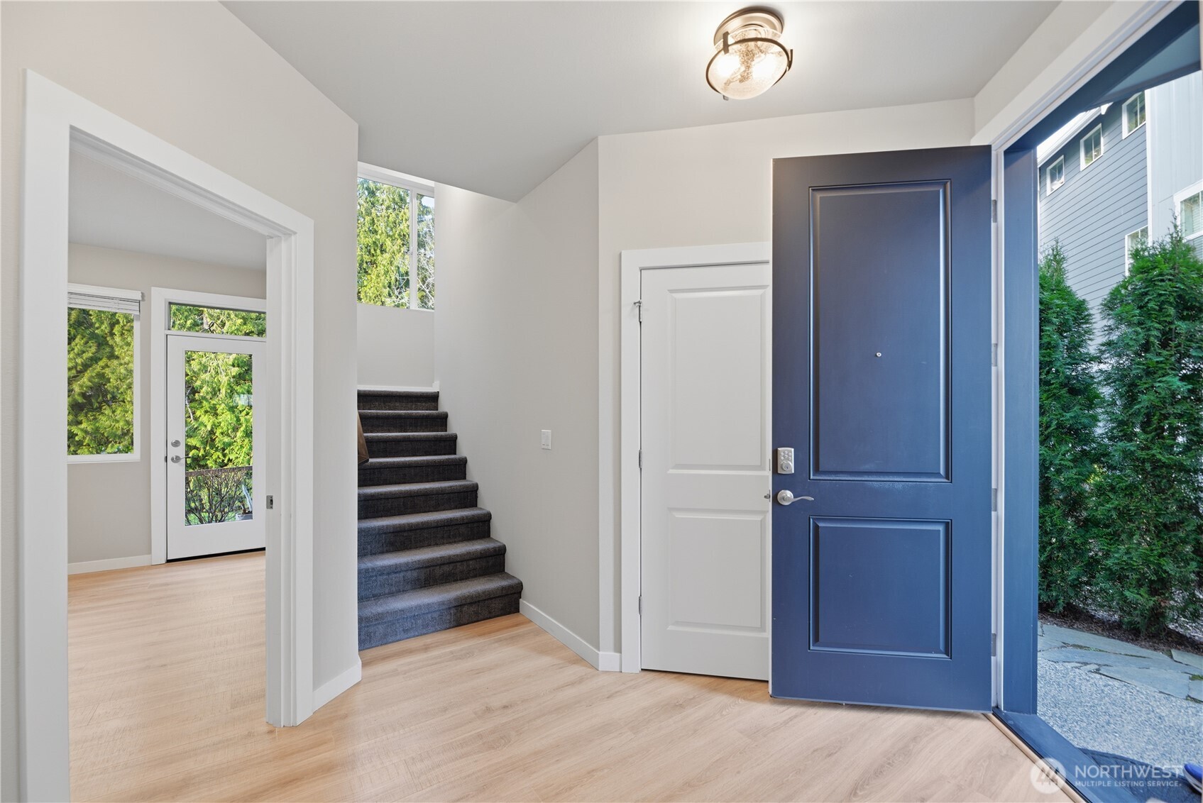 1621 Seattle Hill Road, Unit J5 Bothell, WA 98012 - Photo 10 of 40 a view of a hallway with wooden floor and entryway