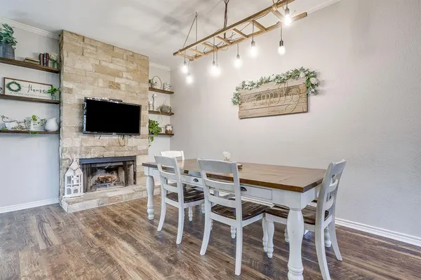 a view of a livingroom with furniture and a fireplace
