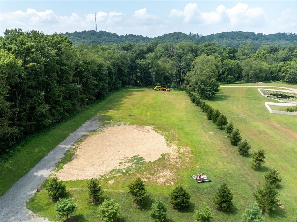 127 Britt Lane Butler, PA 16002 - Photo 3 of 11 a view of a swimming pool with a yard