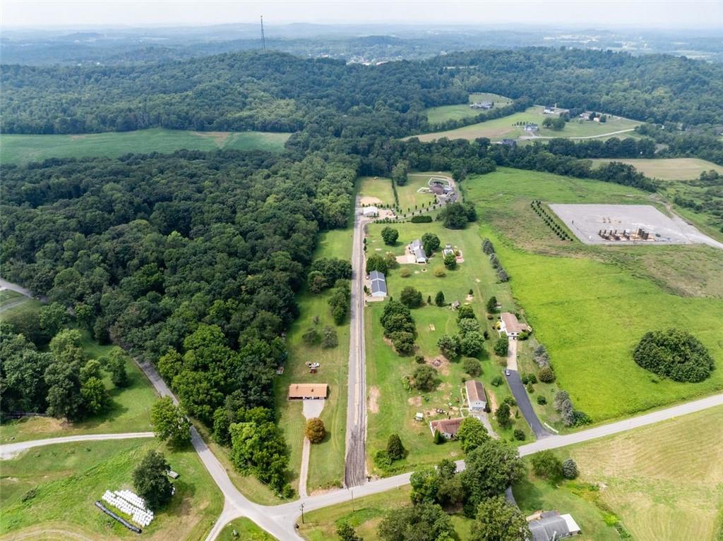 127 Britt Lane Butler, PA 16002 - Photo 9 of 11 an aerial view of residential houses with outdoor space and trees