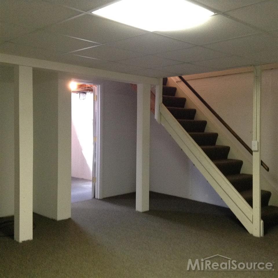 1135 Tienken Court, Unit 17 Rochester, MI 48306 - Photo 23 of 25 Nicely Finished Basement