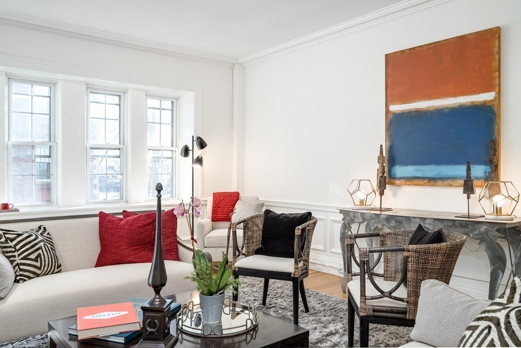986 Memorial Drive, Unit 404 Cambridge, MA 02138 - Photo 7 of 41 a living room with furniture and a large window