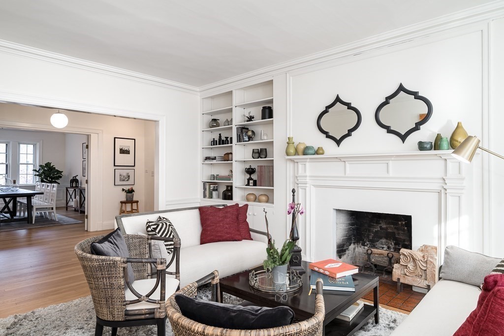 986 Memorial Drive, Unit 404 Cambridge, MA 02138 - Photo 8 of 41 a living room with furniture and a fireplace