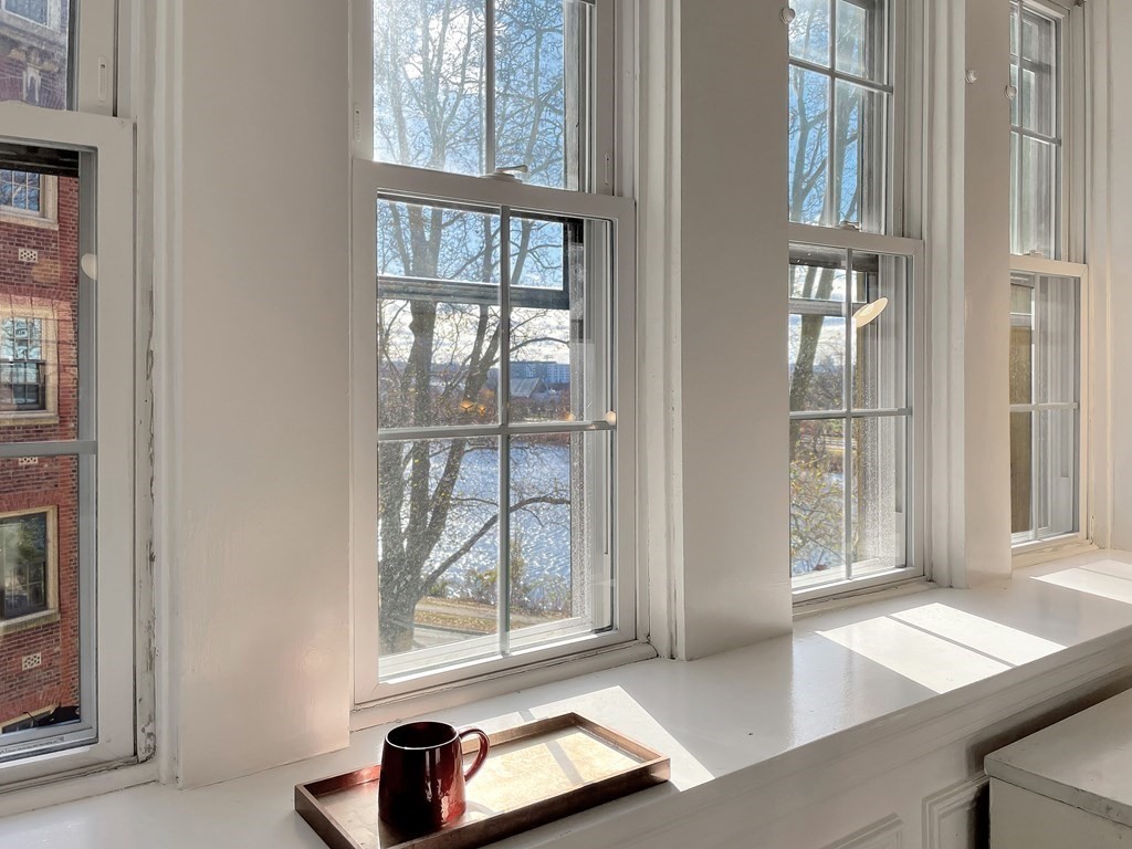 986 Memorial Drive, Unit 404 Cambridge, MA 02138 - Photo 9 of 41 a view of an empty room and window