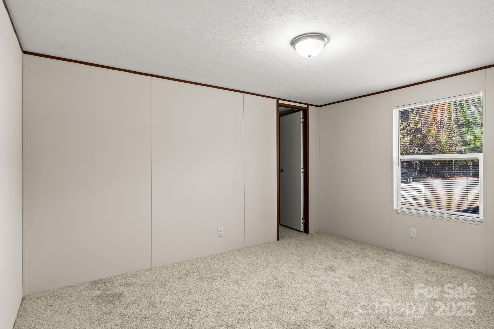 1080 Beckham Road Salisbury, NC 28147 - Photo 22 of 30 a view of an empty room with a window