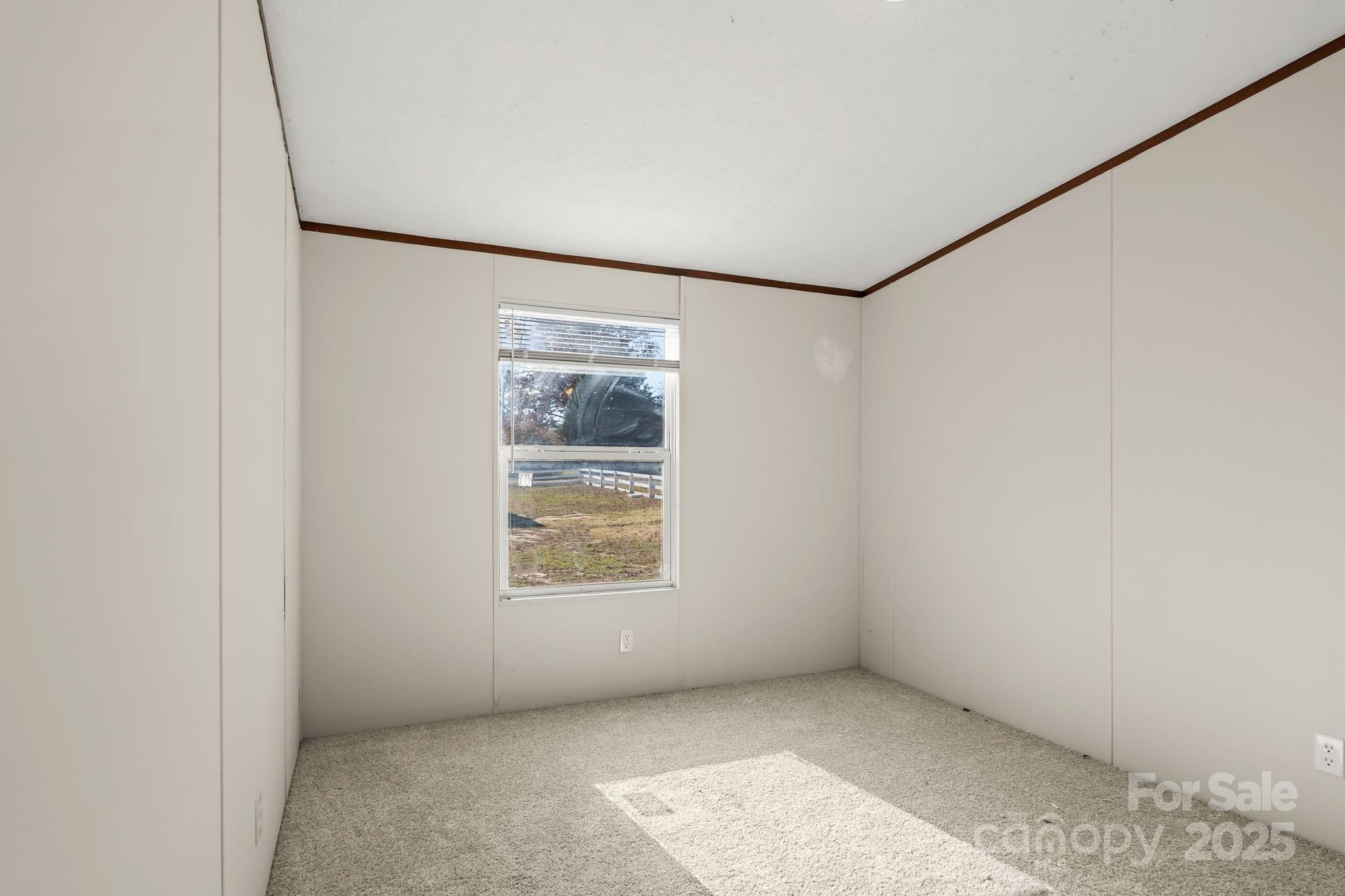 1080 Beckham Road Salisbury, NC 28147 - Photo 23 of 30 an empty room with windows