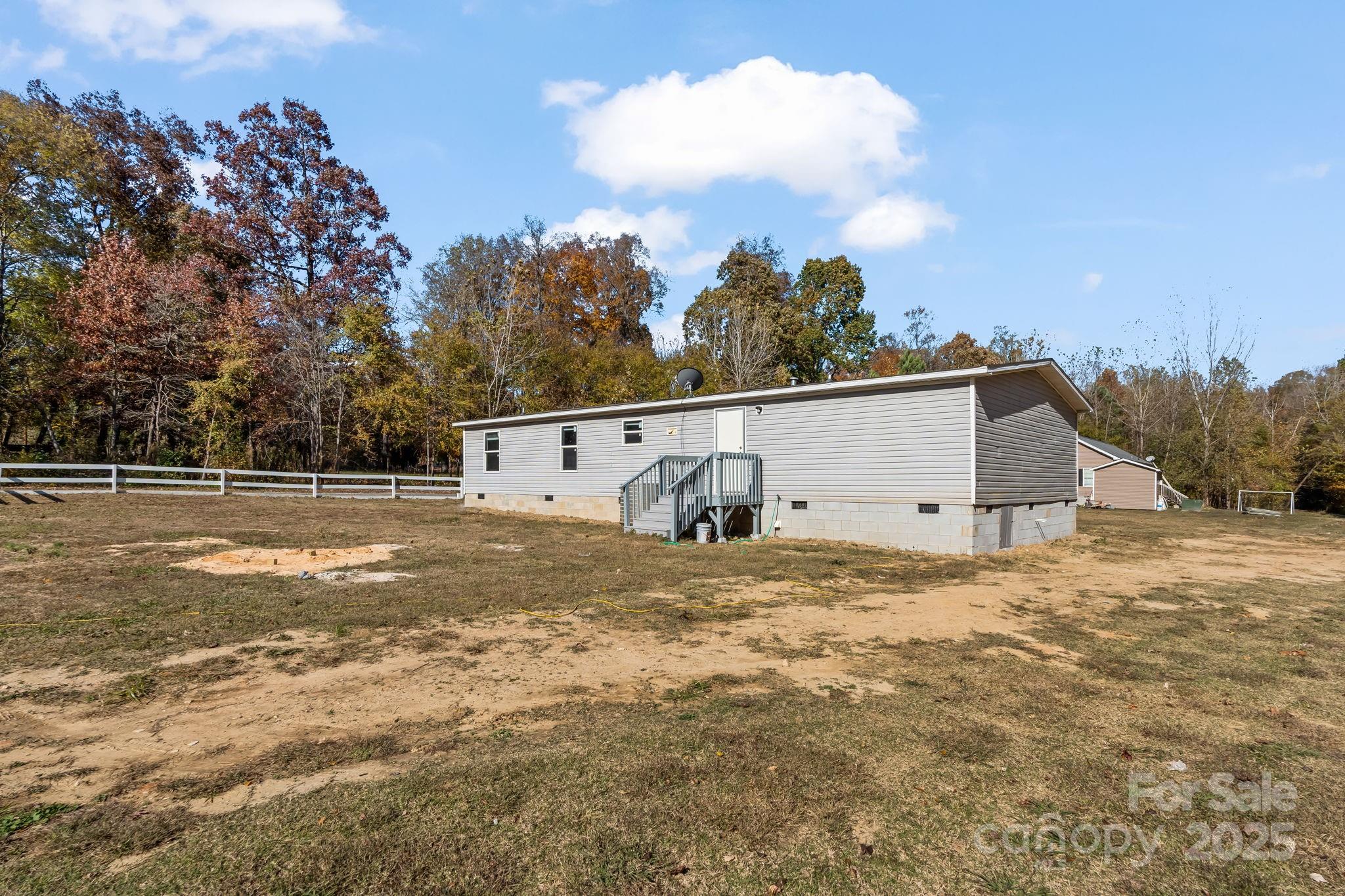 1080 Beckham Road Salisbury, NC 28147 - Photo 29 of 30 a view of a house with a outdoor space