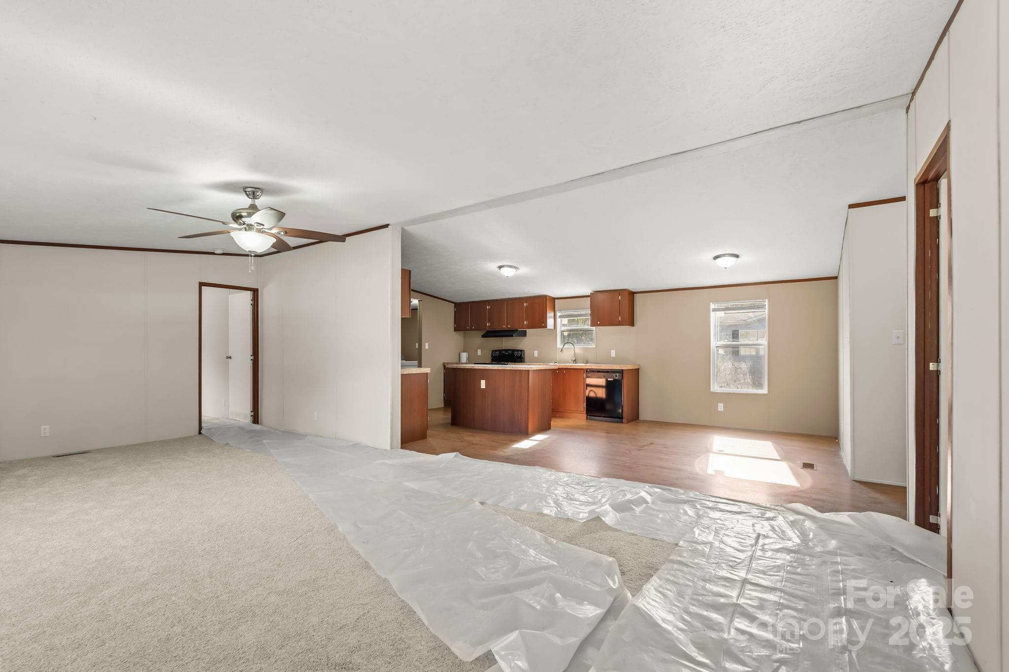 1080 Beckham Road Salisbury, NC 28147 - Photo 8 of 30 a view of a livingroom with a staircase