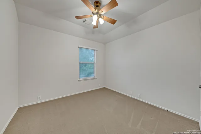 a view of yard with grass and a trees