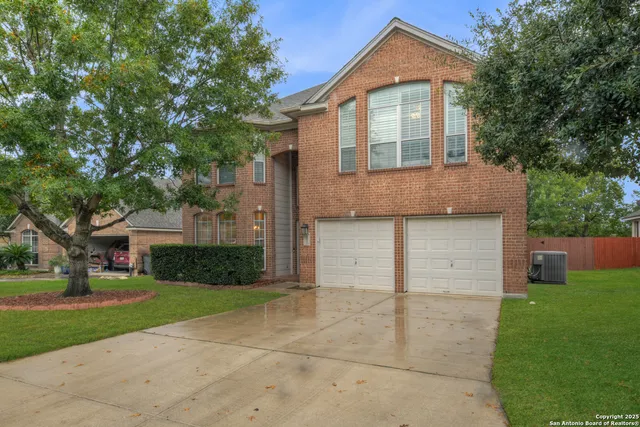 a spacious bathroom with double vanity sink a large mirror and shower
