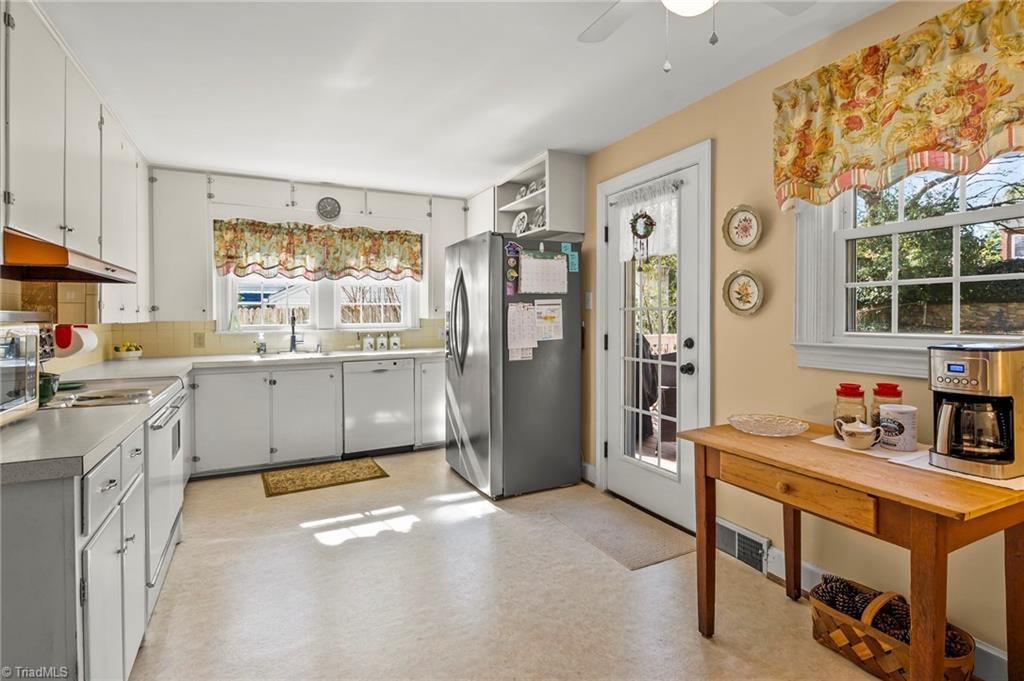 1940 Robinhood Road Winston-Salem, NC 27104 - Photo 6 of 25 Sunny kitchen with so much potential