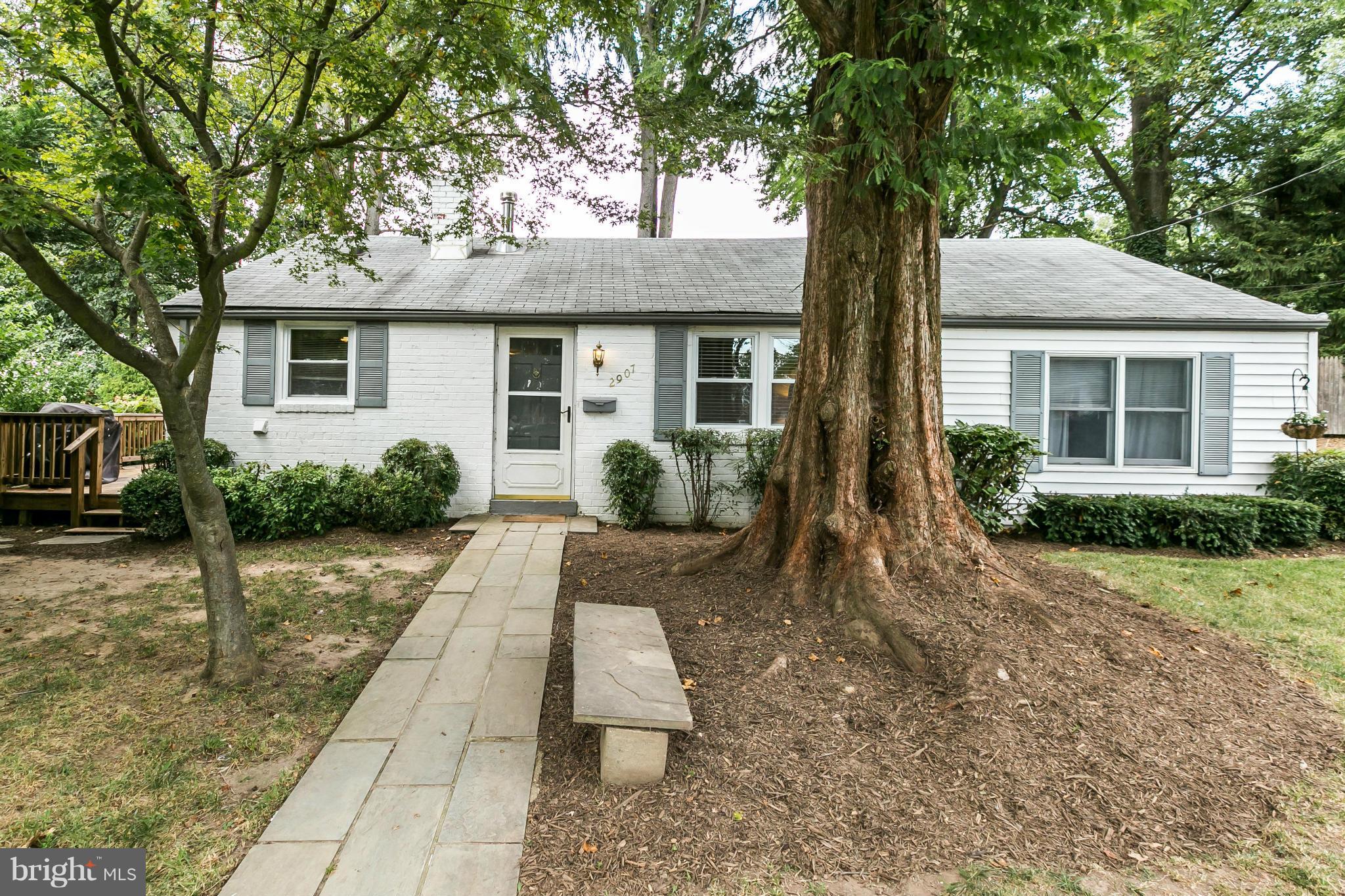 2907 Weisman Road Silver Spring, MD 20902 - Photo 1 of 30 a front view of a house with a yard
