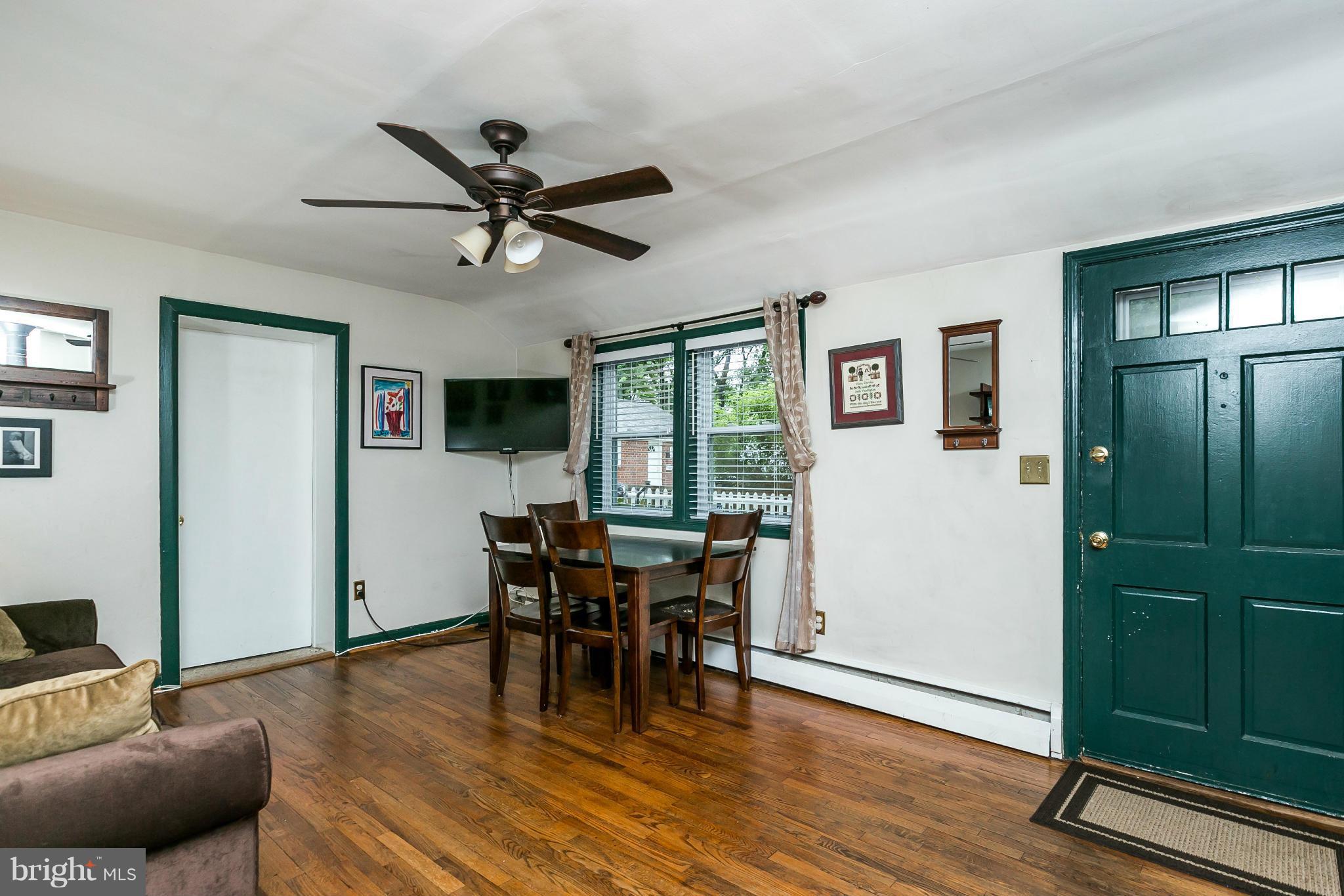 2907 Weisman Road Silver Spring, MD 20902 - Photo 3 of 30 a view of a livingroom with furniture and hardwood floor